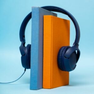 photo of two books wearing headphones. Make money online by transcribing audio to text.